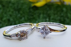 Two solitaire diamond rings