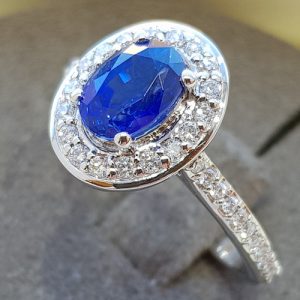 Oval blue halo sapphire and diamond cocktail ring