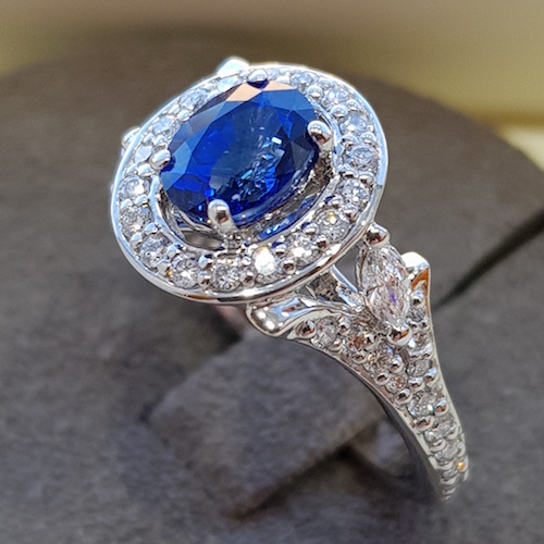 Oval blue sapphire ring floral resized - N J Geddes