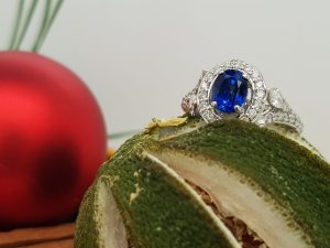 Blue halo sapphire ring