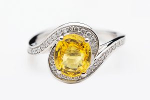 Yellow sapphire and diamond ring